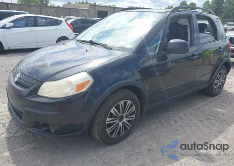 2009 Suzuki Sx4 Technology z USA, uszkodzony, nr VIN JS2YB413296204523